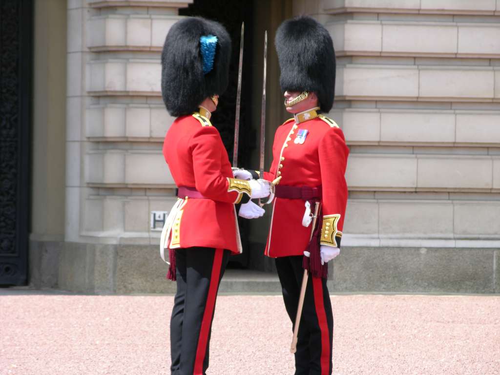 London 01 15 Buckingham Palace Changing of the Guard The New Guard marches to the Palace from Wellington Barracks with a Guards band, the Old Guard hands over in a ceremony during which the sentries are changed and then returns to barracks. The New Guard then marches to St James's Palace leaving the detachment at Buckingham Palace